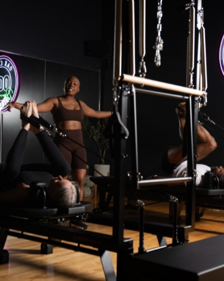 A private session on the Cadillac Reformer at Oak Cliff Pilates